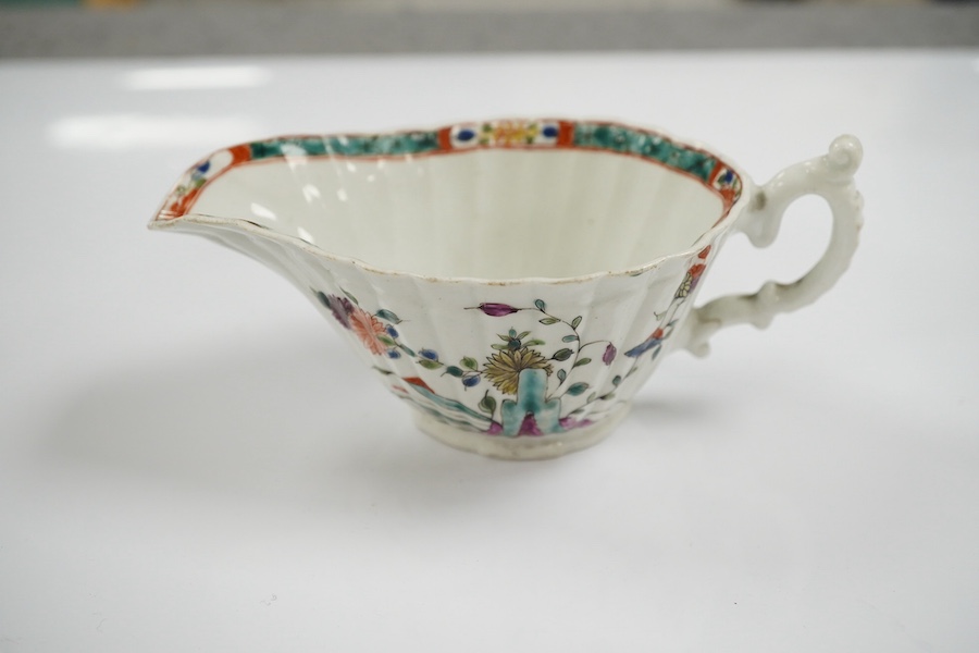 A Bow porcelain butter boat, c.1760, 13cm. Condition - fair to good